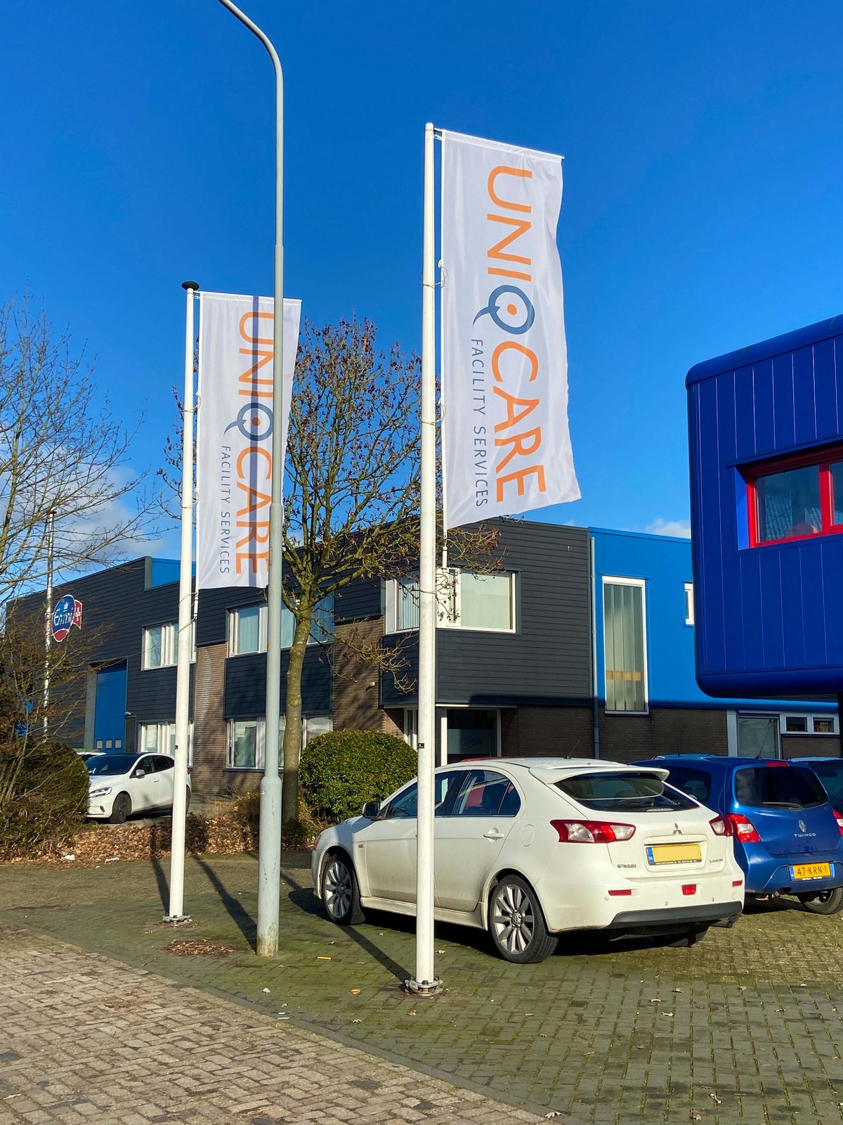Baniervlaggen voor Uniqcare